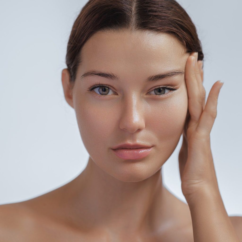 Anti Aging Treatment and Facelift Skin Care Concept. Woman with hand on cheek and eye