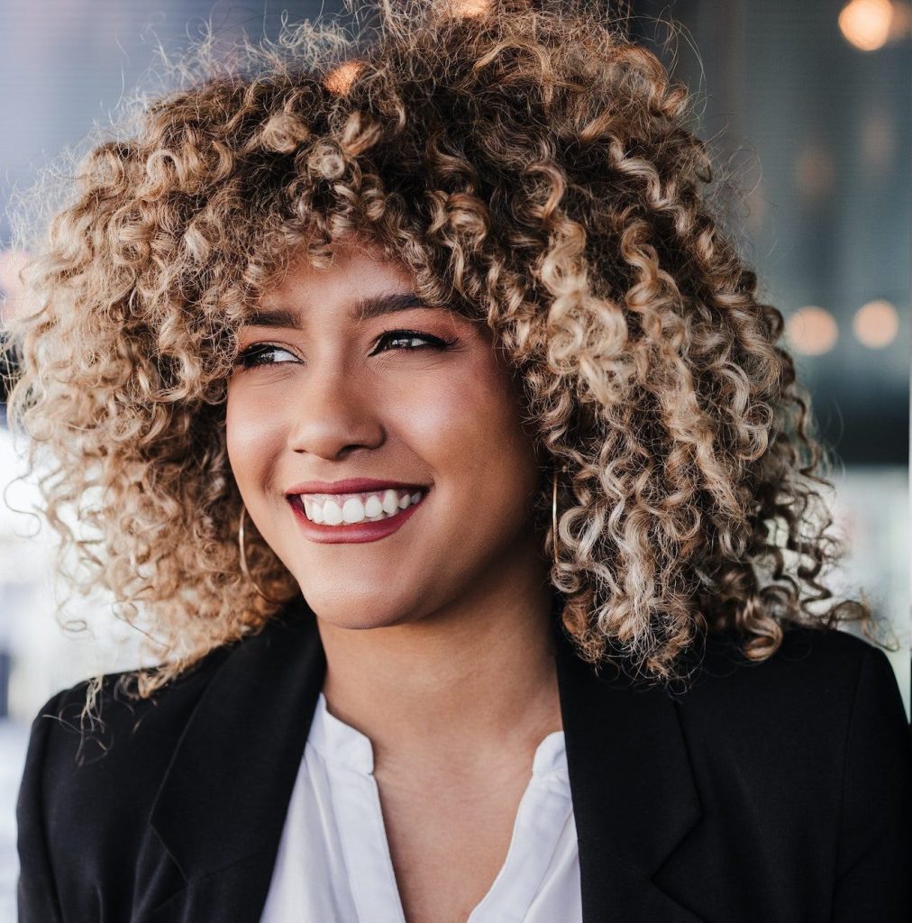 portrait of happy confident business woman in cafe. Business concept Surgical Dentistry