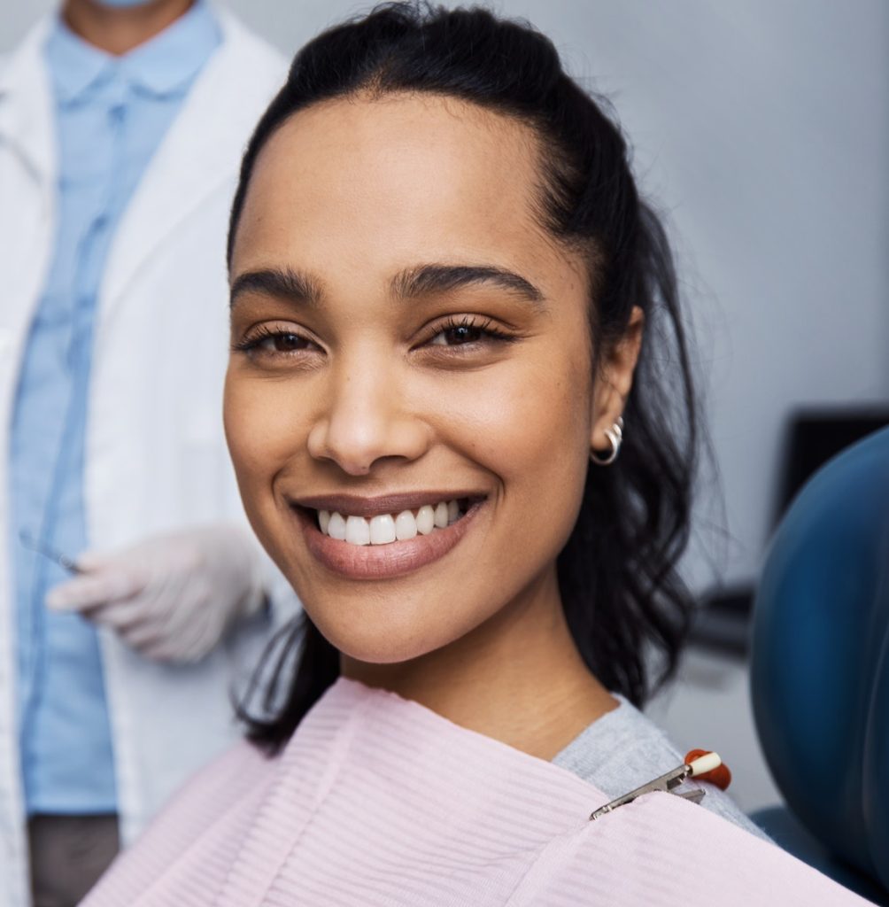 Patient Services Portrait of a young woman having dental work done on her teeth